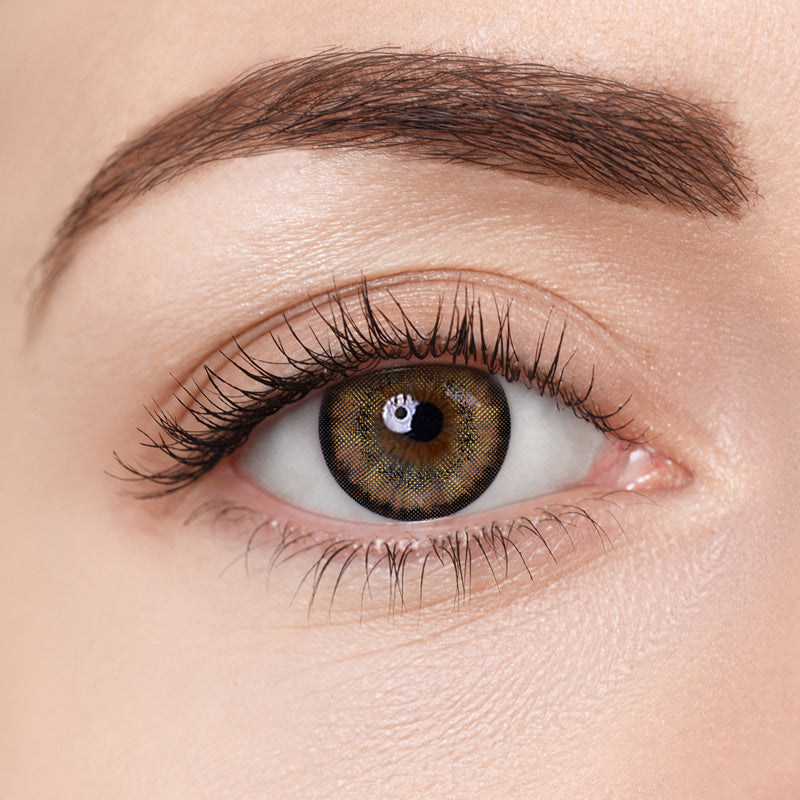 Aura Lens colored contact lenses in Deep Brown – intense, dark brown lenses that create a bold, defined look while maintaining a natural finish.