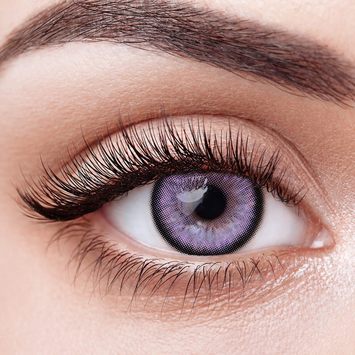 Aura Lens colored contact lenses in Fuchsia Parcel – vibrant pink-toned lenses designed for a striking and playful eye transformation.