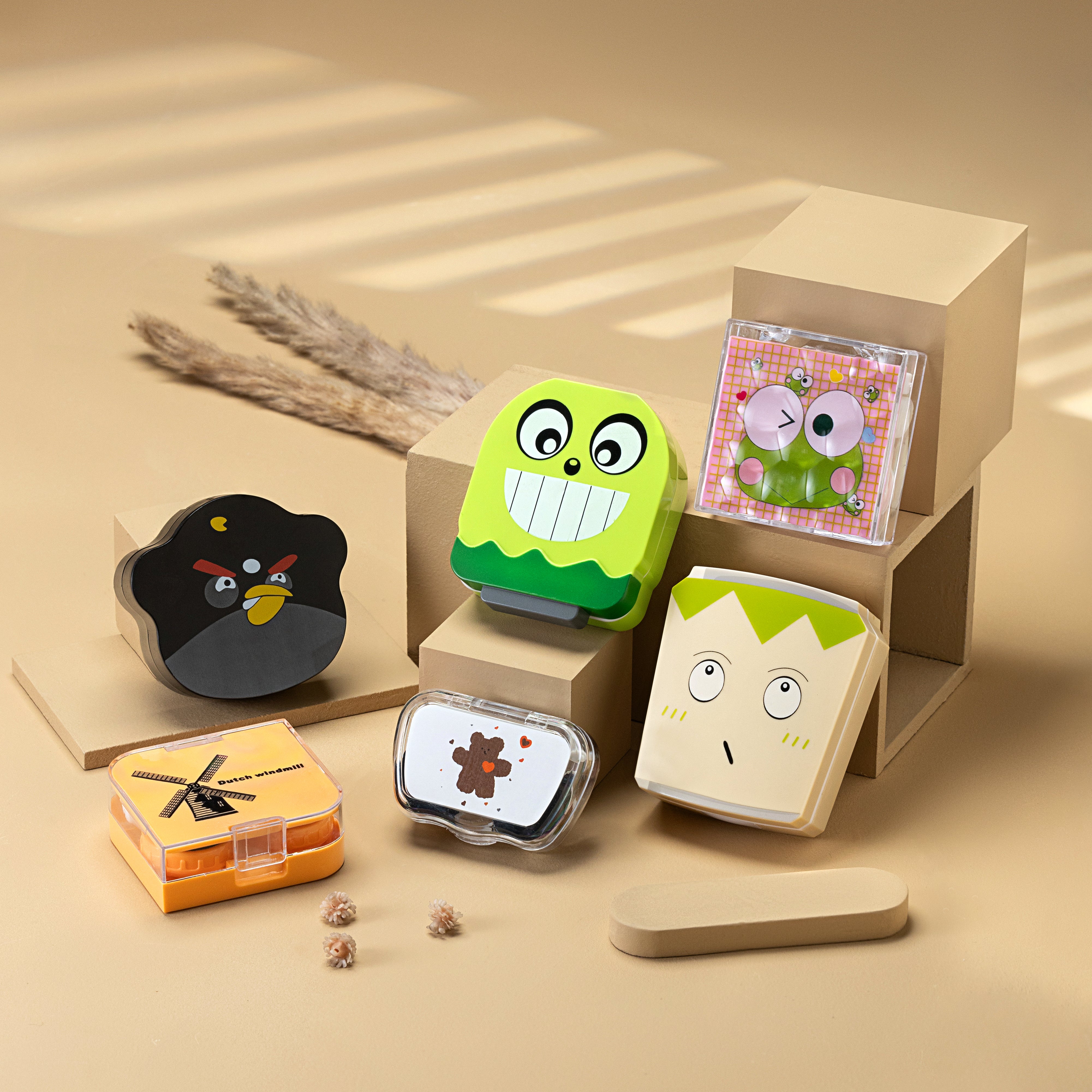 Contact Lens Travel Kit by Aura Lens featuring lens case, solution bottle, applicator, tweezers, and mirror in a compact portable case