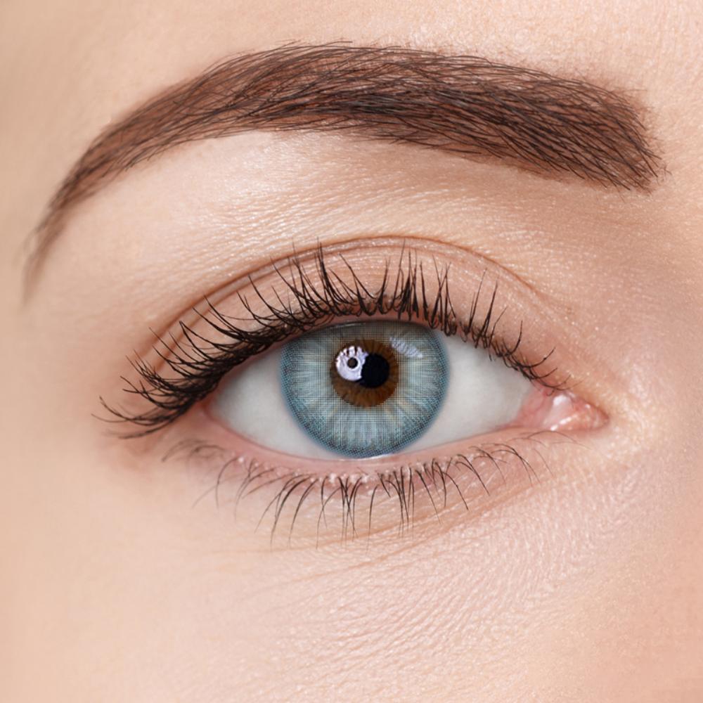 Frost Blue contact lenses by Aura Lens, designed for a subtle yet captivating light blue eye transformation.